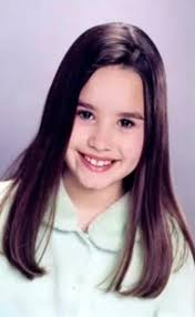 Caption : Demi Lovato's childhood photo