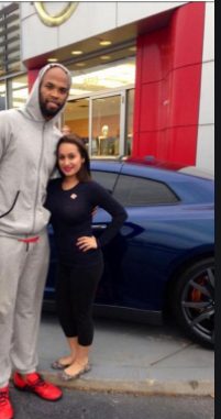 Caption:Taj Gibson and his friend with his car
