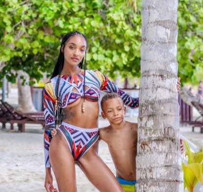 Jourdan Dunn posing for a photo with her little son