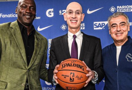 Adam Silver posing for a photo with his friend