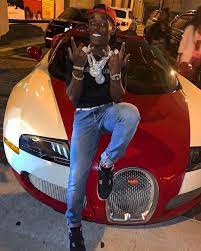 Lil Uzi Vert with his car
