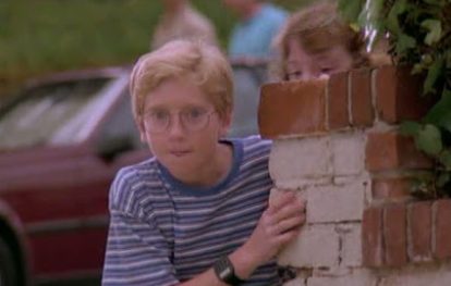 Childhood photo of Christopher Castile with car