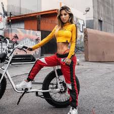 Ayla Woodruff posing for the photo with her cycle