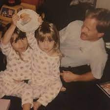 Ayla Woodruff's childhood photo with her sister and father