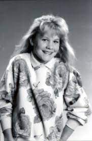 Caption :Josie Davis's childhood photo