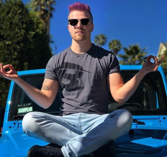 Hunter Ray Hill sitting in his car