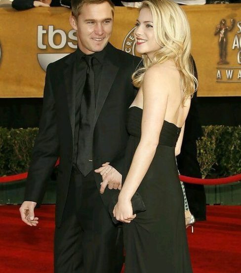 Laura Ramsey posing for a photo with her boyfriend