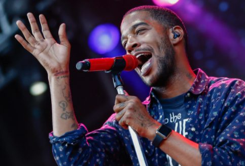 Kid Cudi singing in the stage
