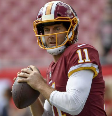 Alex Smith playing football 