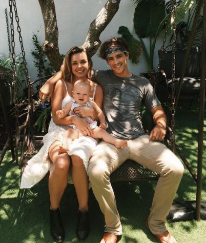 Chloe Pacey and her boyfriend, Brenton Thwaites with their daughter