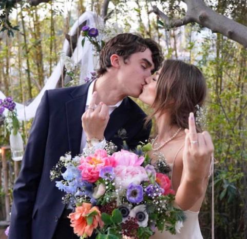 Deaken Bluman and his wife, Elin Bluman on their wedding day