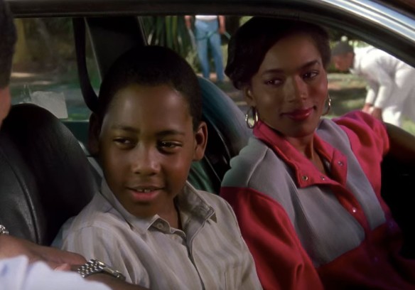 Desi Arnez Hines II posing inside the car on the set of Boyz n the Hood