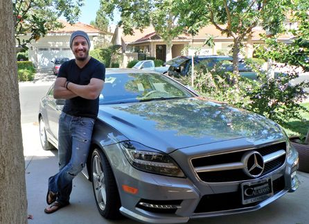 Fabio Viviani posing with his car
