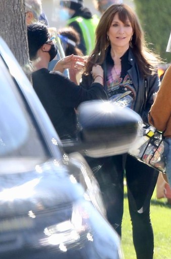 Freddie Beckmeier's ex-wife, Katey Sagal posing with her car
