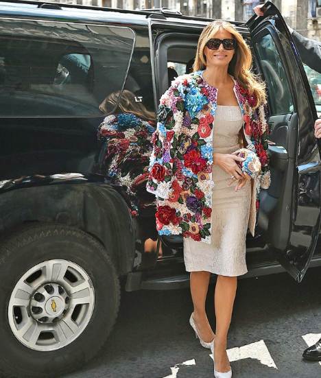 Hank Siemers's rumored girlfriend, Melania Trump posing with her car