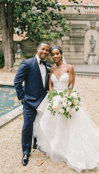 Marcus Richardson with his wife, Abby Phillip on their wedding day