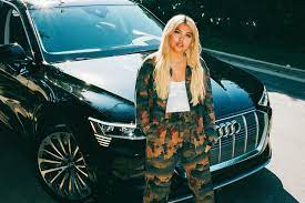 Hayley Kiyoko with the car