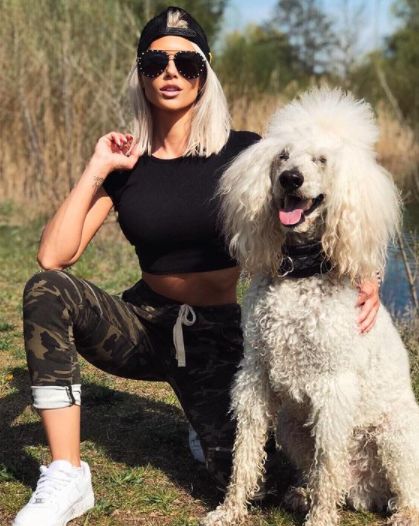 Tereza Dzet posing with her pet dog