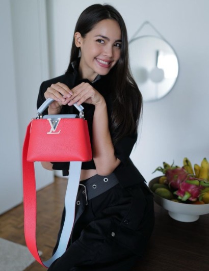 Urassaya, Thai actress posing for a photo