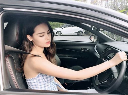 Urassaya Sperbund driving her car