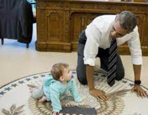 Genevieve Mecher playing with her father