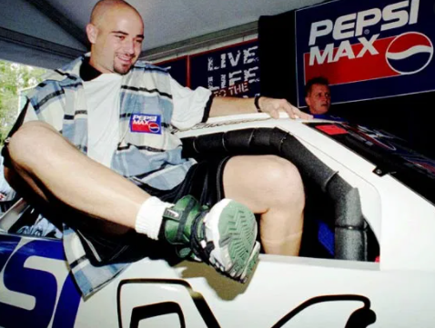  Andre Agassi with his car 
