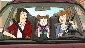 J. G. Quintel inside the car with his freind 