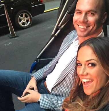 Mike Caussin clicking selfie with his wife