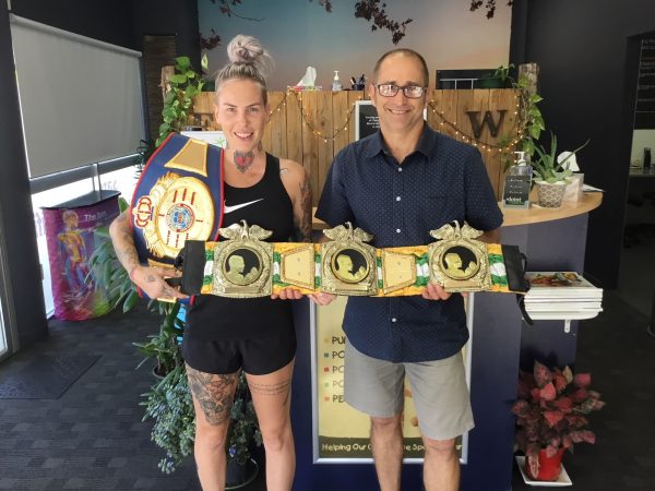 Bec Rawlings with her partner Adrian Rodriguez