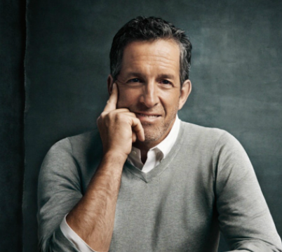 Kenneth Cole posing for a photo