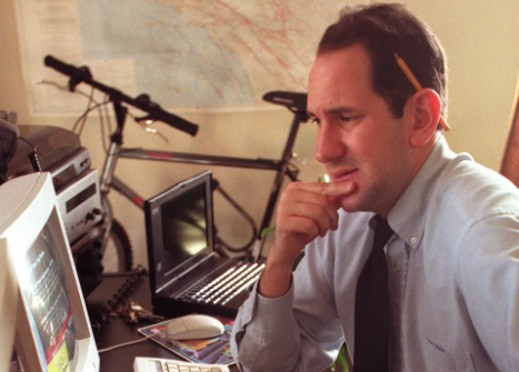 Matt Drudge sitting in front of computer