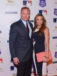 Morgan Leslie Heuman posing for the photo with her husband Brian Bosworth