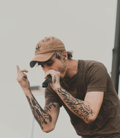 Late Kyle Pavone singing on the stage