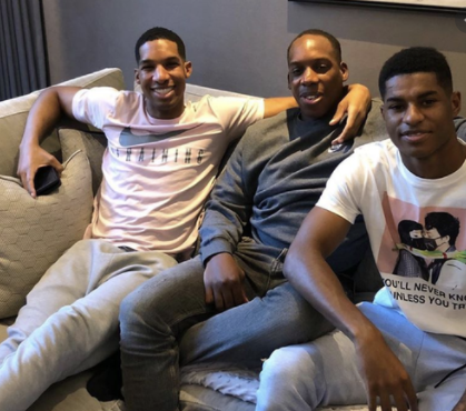 Dwaine Maynard with his brothers