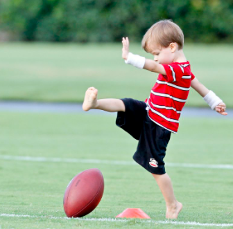 Baylen Robert Brees playing football