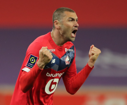 Burak Yılmaz standing in a frame 