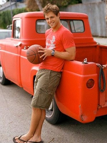 Cassidy Boesch's husband, Samuel Page posing with his vehicle