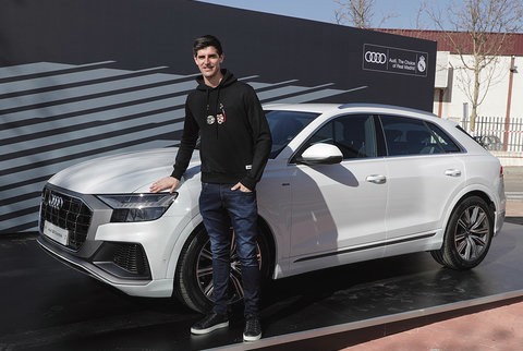 Thibaut Courtois, Elsa Izac's ex-boyfriend, poses with his car