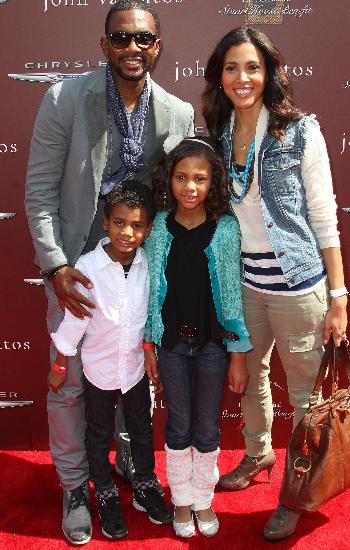 Kristen Baker Bellamy with her husband, Bill Bellamy, and their children