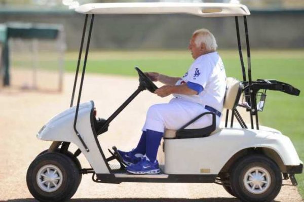 Laura Lasorda's father Tommy Lasorda driving the auto