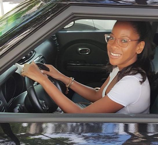 Nneka Elliott driving her car