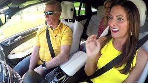 Late Fred Mcleod sittimg inside the car with his wife