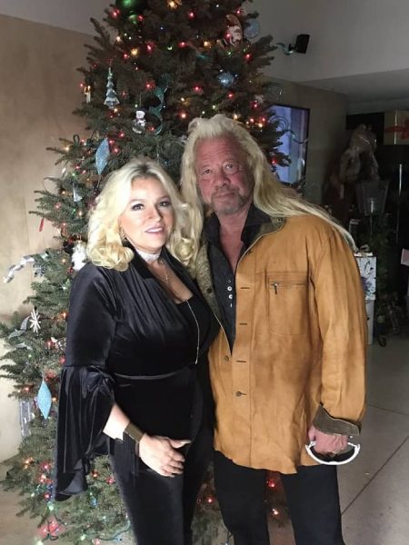 Dominic Davis's mother and father posing for the photo