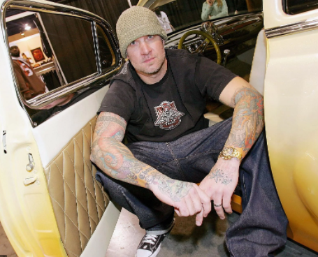Jesse James posing for a photo