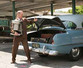 Late Ray Kroc standing outside his car