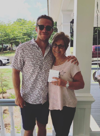 Taylor Heinicke with his friend