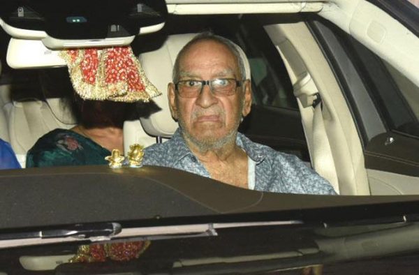 Veeru Devgan sitting inside the car