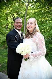 Corrie Bird wedding photo with her husband Trent Theopolis Batson
