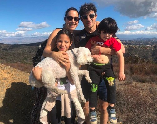 Matt Gutman with his wife and children