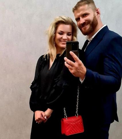 Mixed martial artist with his girlfriend, Dorota 